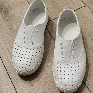 All White Native Slip Ons